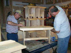 Harlan & his dad in workshop crafting a bench.